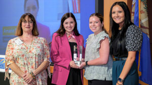 Oklahoma Farm Bureau accepts the Oklahoma Venture Forum's 2025 Economic Impact Award