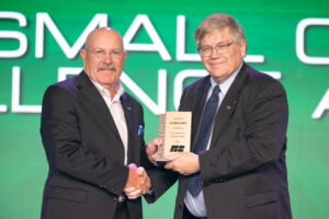 Oklahoma Farm Bureau President Rodd Moesel (right) presents James Fuser of Ottawa County Farm Bureau with the OKFB County Excellence Award on Saturday, Nov. 11 at the 2023 Oklahoma Farm Bureau Annual meeting in Oklahoma City.